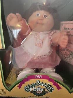1985 Cabbage Patch Doll NEW IN BOX Brown hair Pink dress Ultra Rare Vintage