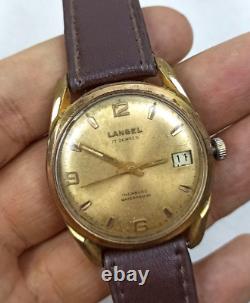 Vintage Langel watch 17 jewels gold date 1960's ultra rare mint condition swiss